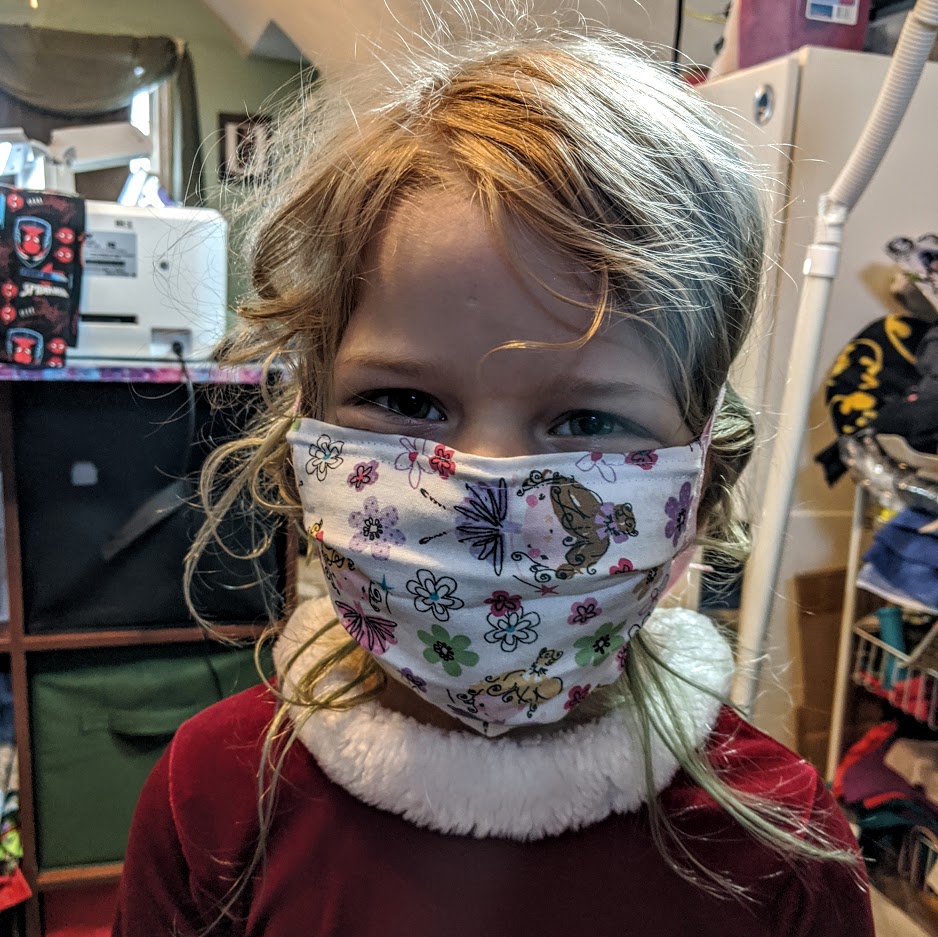 a kid wearing a mask